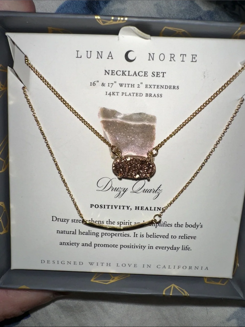 Luna Norte 14kt gold-plated brass layered necklace set features a sparkling